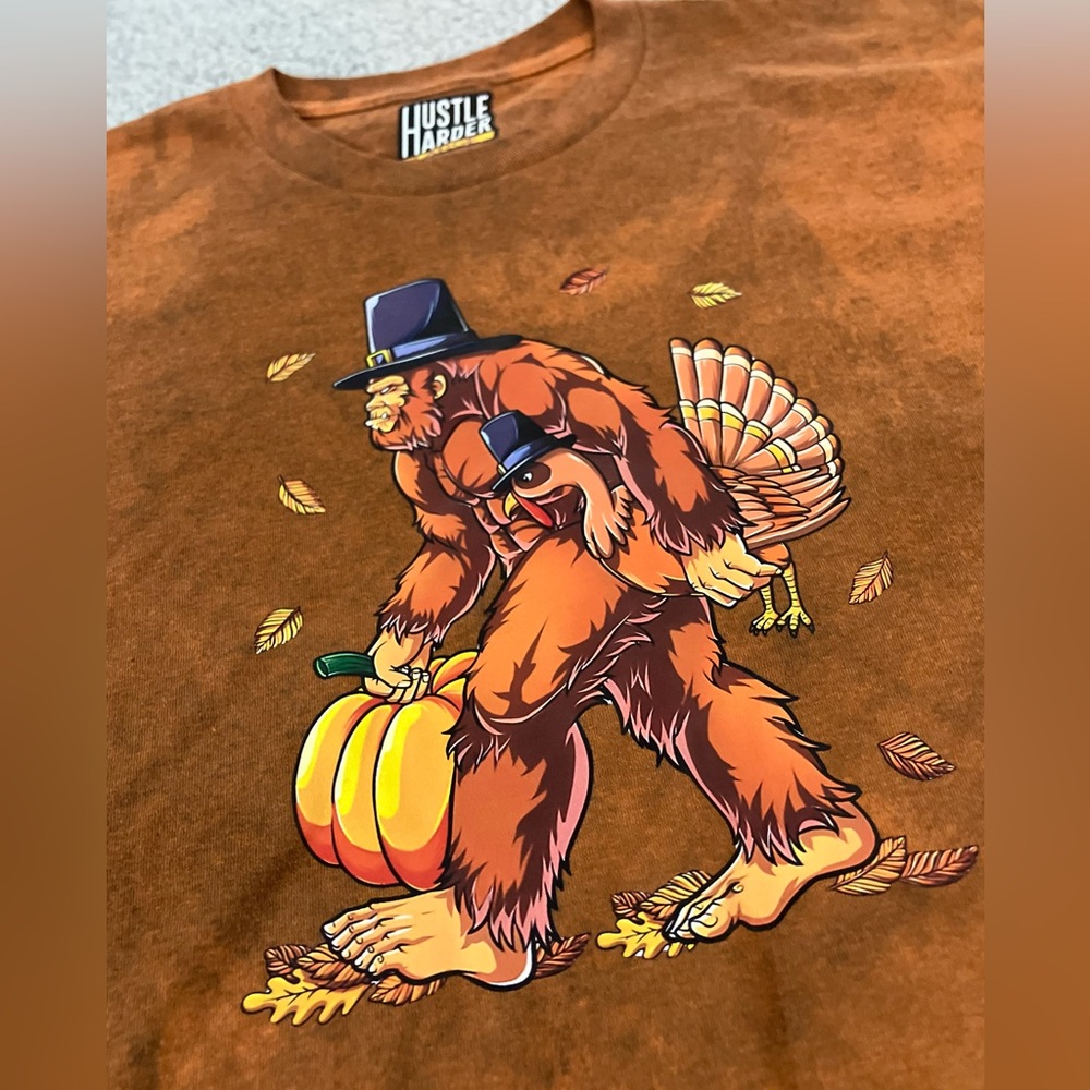Big Foot Sasquatch Thanksgiving Pumpkin Turkey Fall Leaves Dark Orange Fade Tee